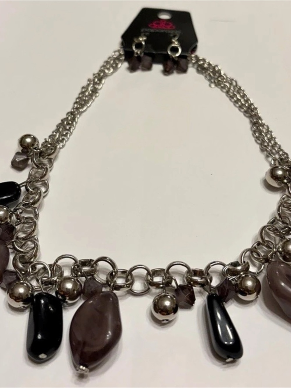 Paparazzi’s Statement Charm Necklace in Silver & Black NWT